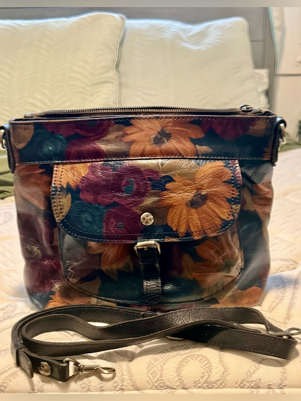 Patricia Nash, “Tuscania”, leather, featuring floral Peruvian Hand Painting.